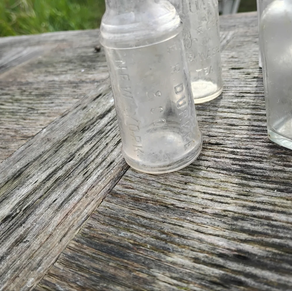 Collection of 8 vintage antique bottles